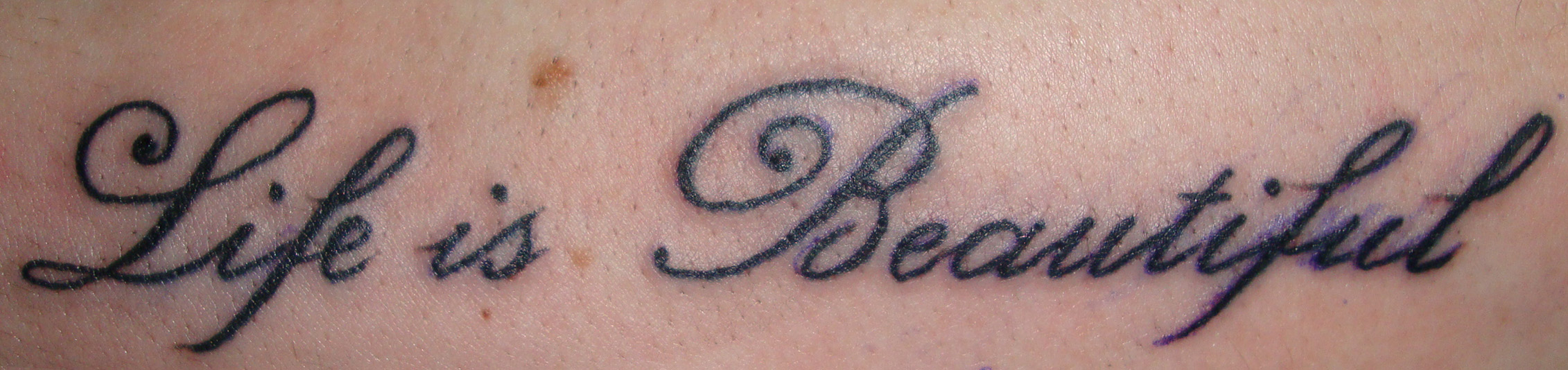 Tattoo uploaded by Victoria Hennes  Life is beautiful in Italian   Tattoodo